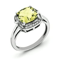 Prsten od čistog srebra s dijamantom i limunovim kvarcom. Težina karata je 0,1 karata. Težina dragulja-3,2 karata